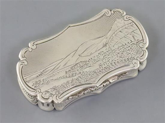 A Victorian silver shaped oval vinaigrette by Nathaniel Mills, the lid engraved with landscape scene,